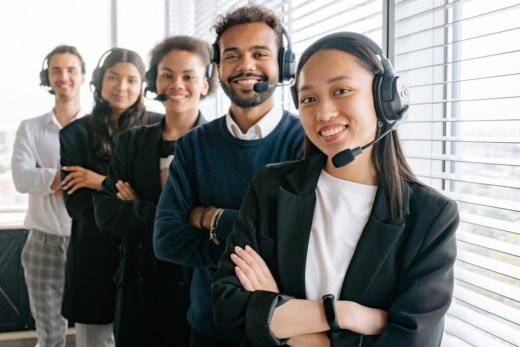 Photo by Yan Krukau: https://www.pexels.com/photo/happy-call-center-agents-looking-at-camera-8867482/